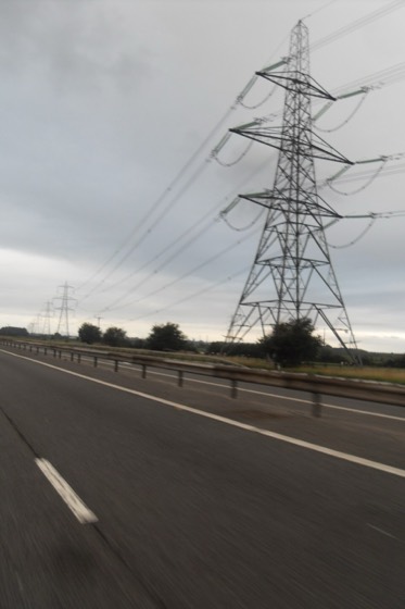 Pylons beside the M56 - geograph.org.uk - 2003353.jpg